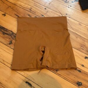 SKIMS High-Waisted Shapewear Shorts in Brown